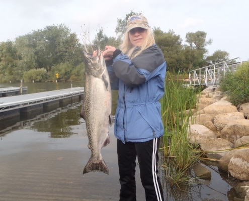 Oak Orchard Tackle and Lodge - woman with Fish